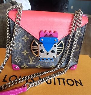 Authentic Louis Vuitton Tribal Mask PM Monogram Canvas Crossbody Bag